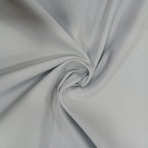 Tela foscurit gris blackout 100% opaca, en poliéster con recubrimiento PVC/acrílico. Ideal para cortinas, control térmico y diseño elegante.