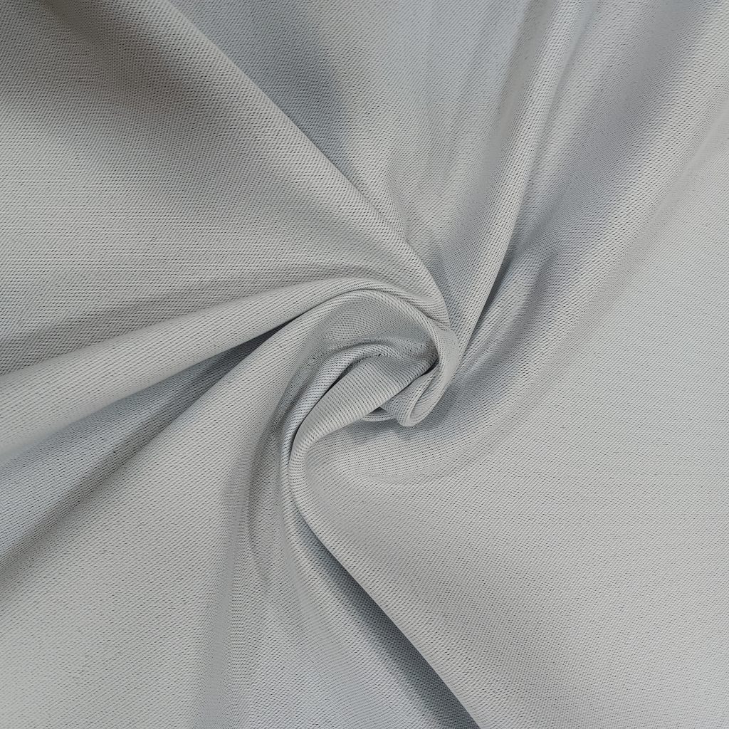 Tela foscurit gris blackout 100% opaca, en poliéster con recubrimiento PVC/acrílico. Ideal para cortinas, control térmico y diseño elegante.