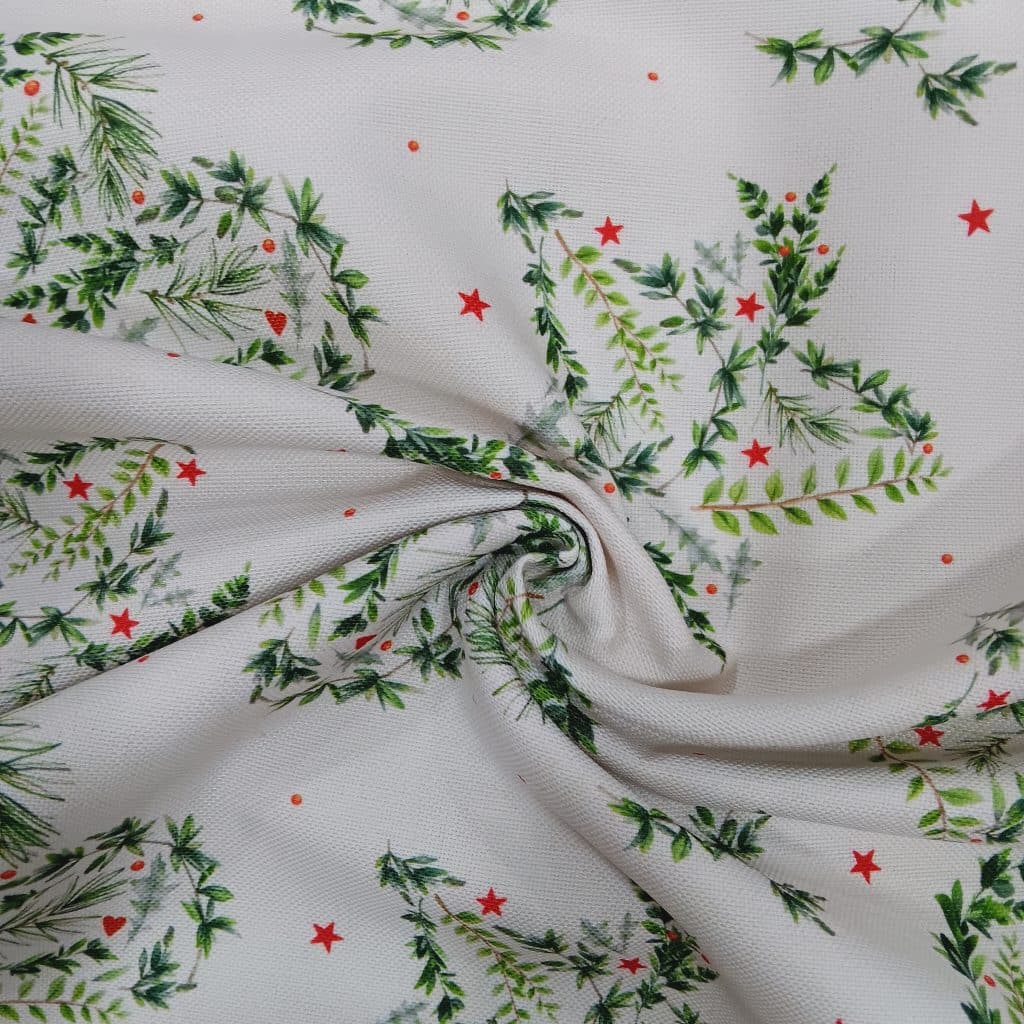 El tejido de mantelería resinada con estampado de Navidad es impermeable y resistente a las manchas