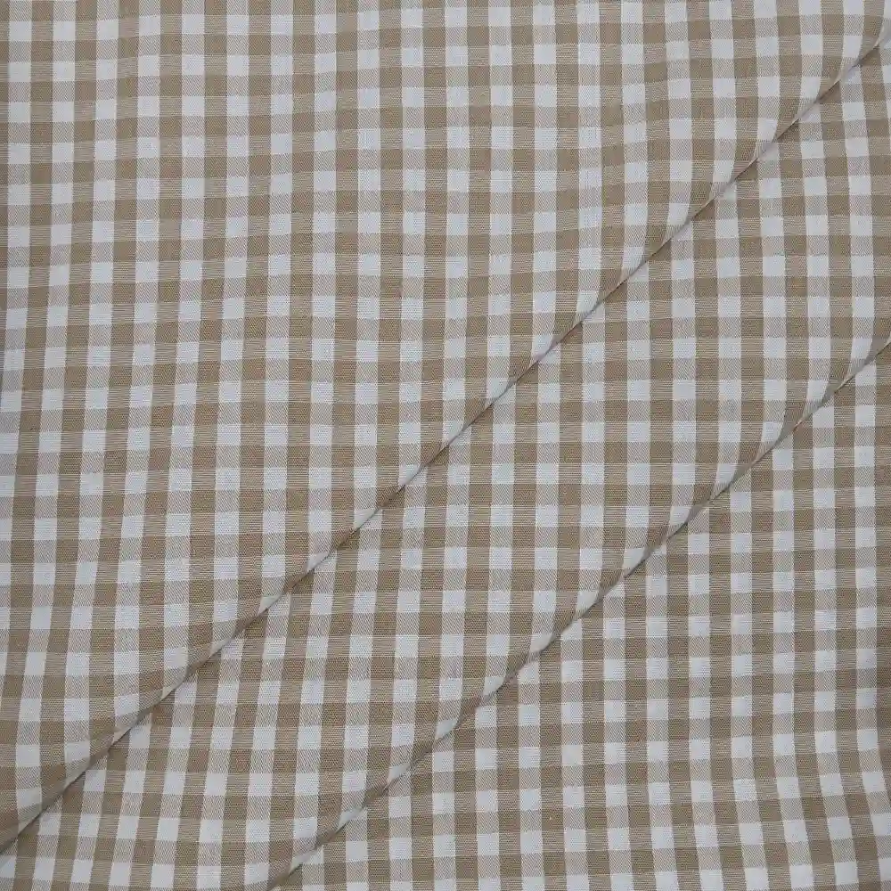 Tela de algodón con estampado de cuadros vichy en color beige y blanco