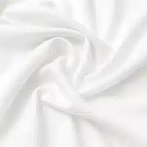 Tela stretch de poliéster en color blanco para confección, disfraces, decoración y proyectos de costura.