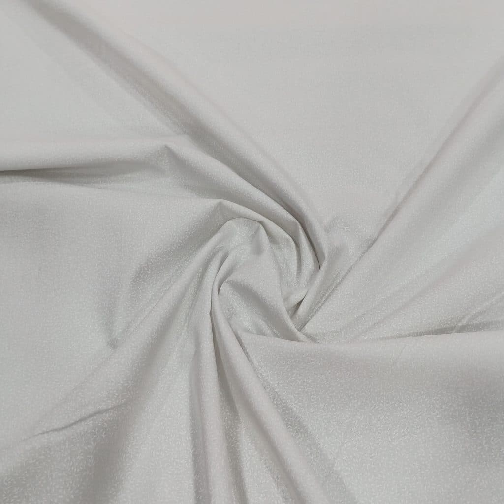 Algodon fondo blanco con florecitas blancas