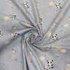 Tela de algodón con estampado de pandas, lunas y estrellas sobre fondo azul. Ideal para costura infantil.