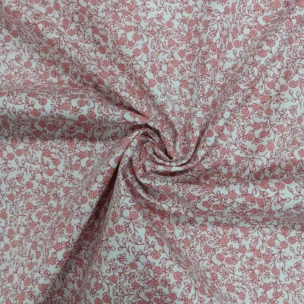 tela-algodon-estampada-flores-pequenas-rojas-3 Tela de algodón estampada con flores pequeñas rojas sobre fondo blanco, ideal para confección, patchwork y decoración.