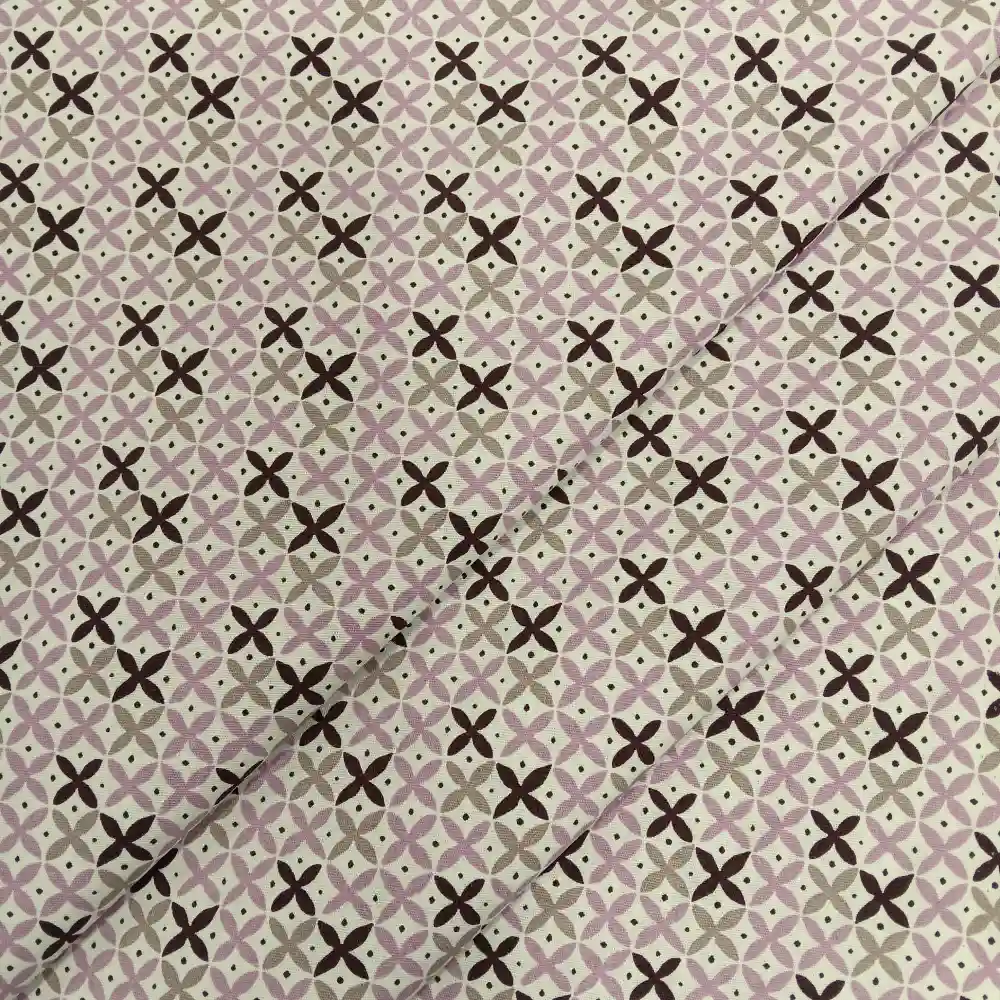 tela-algodon-estampada-geometrica-lila-beige-2 Tela de algodón estampada con cruces en tonos lila y beige, perfecta para confección, patchwork y decoración del hogar.