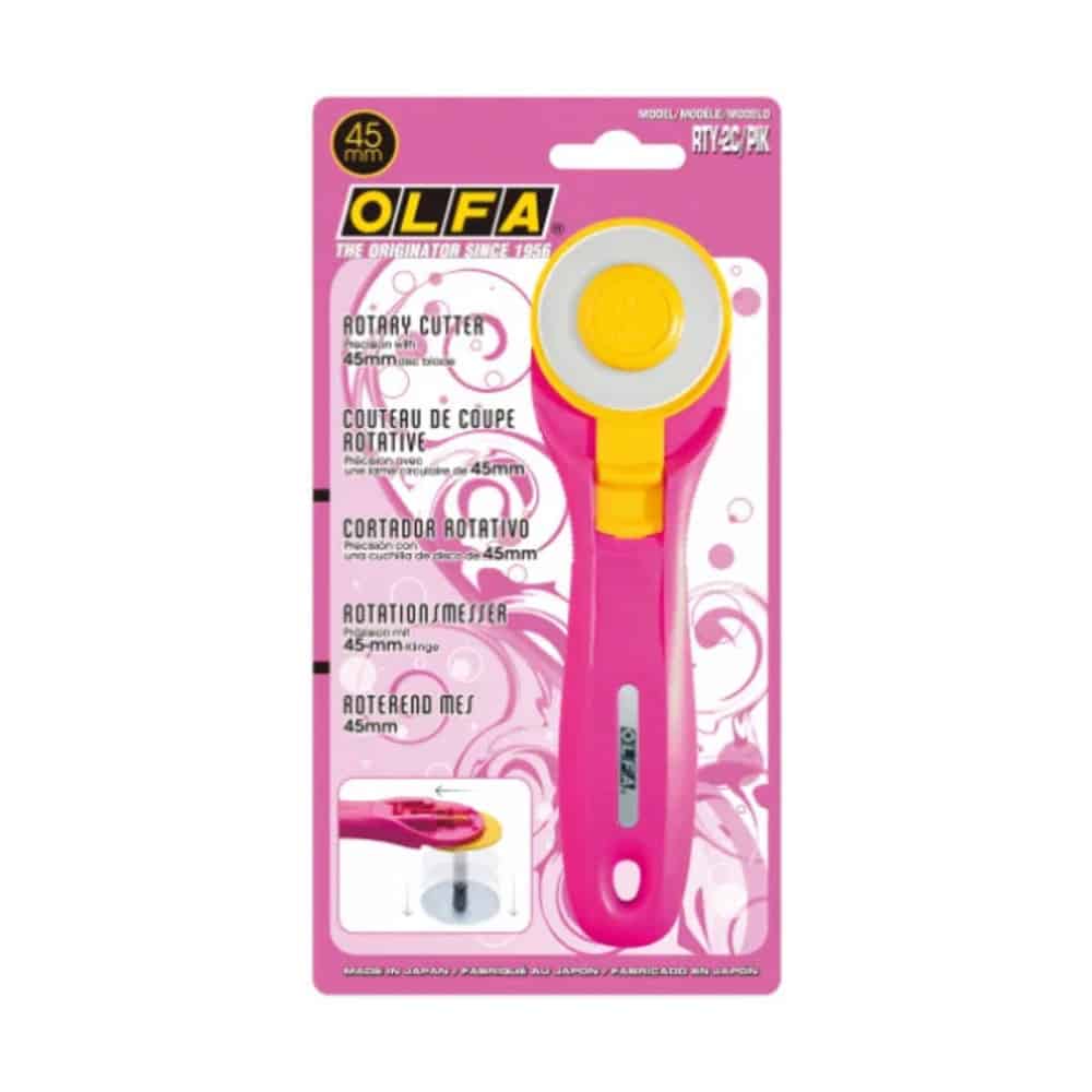 Cortador rotativo OLFA RTY‑2C/PIK con mango rosa y disco de corte de 45 mm, ideal para telas y manualidades