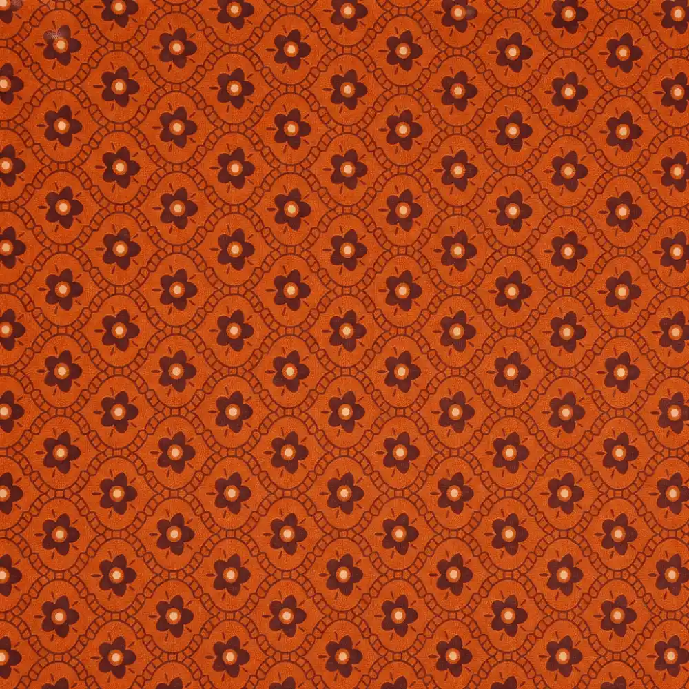 Tela de algodón con estampado de flores marrones y diseño geométrico sobre fondo marrón