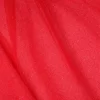 Tela de tul rojo con purpurina plateada ligera y brillante, ideal para disfraces, decoración y confección de carnaval.