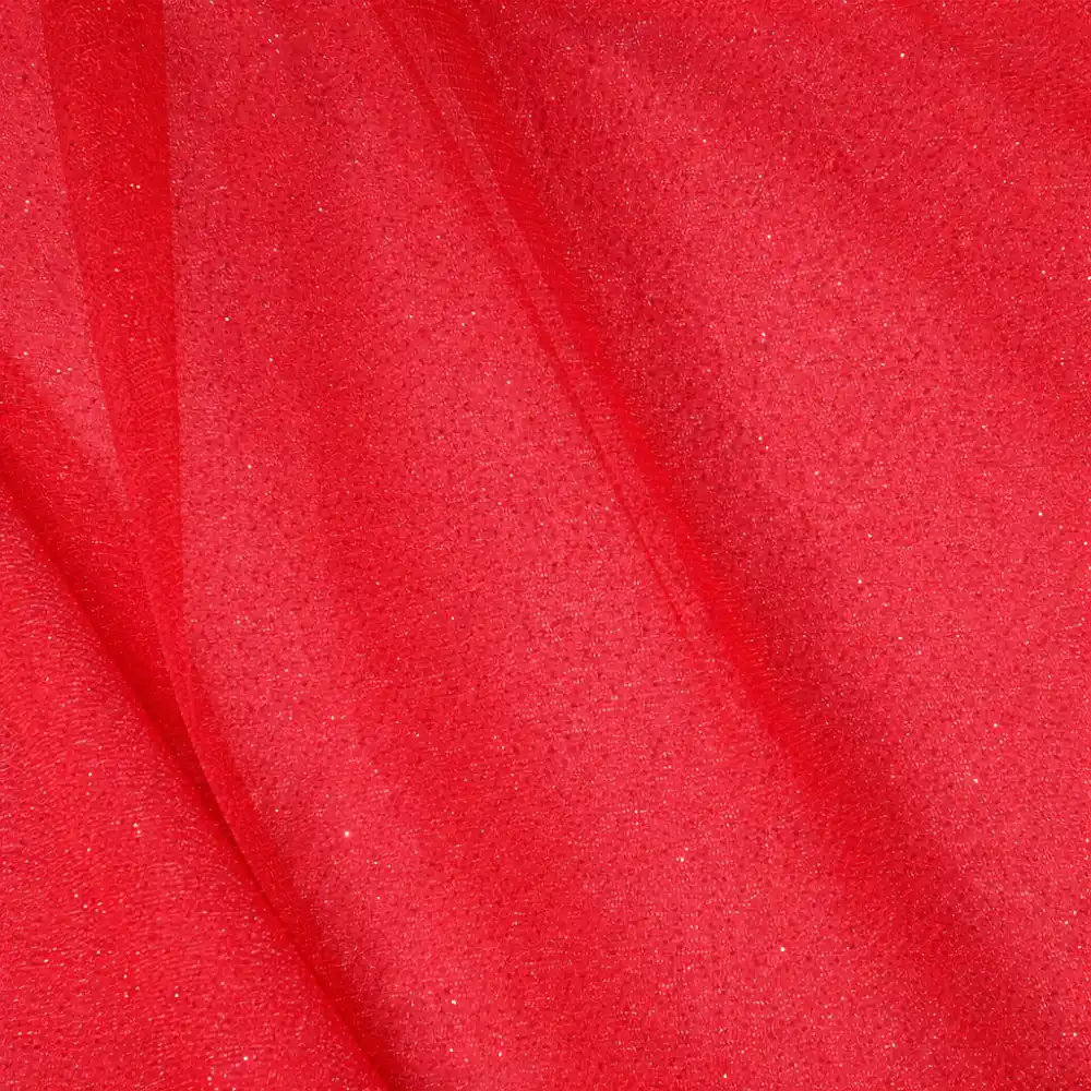 Tela de tul rojo con purpurina plateada ligera y brillante, ideal para disfraces, decoración y confección de carnaval.
