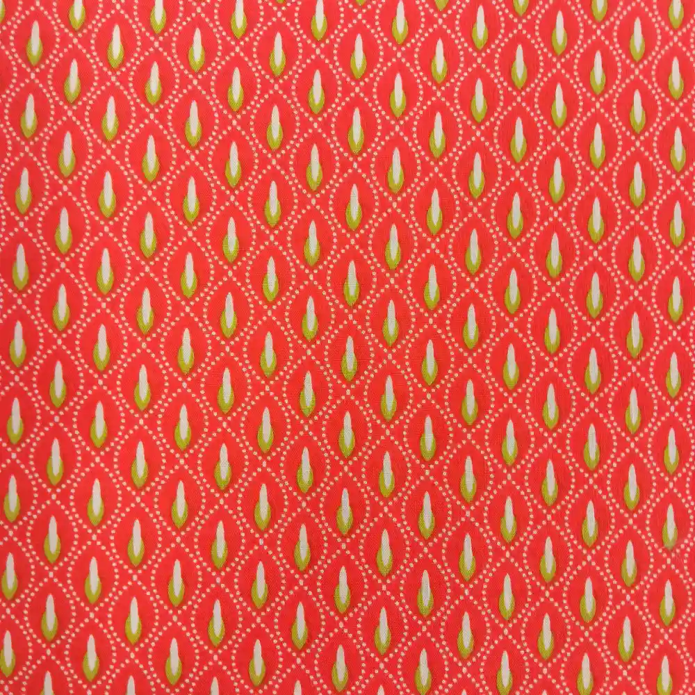 Tela de algodón naranja con estampado geométrico pistacho repetitivo