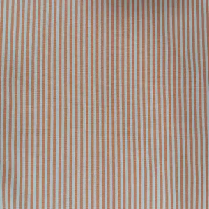 Tela de algodón con rayas blancas y naranjas