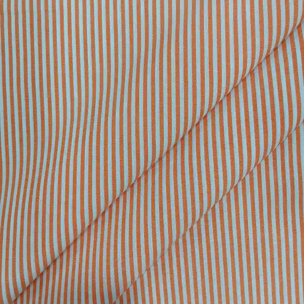 Tela de algodón con rayas blancas y naranjas