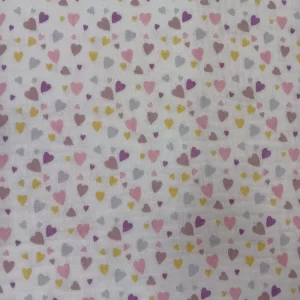 Tela de muselina con estampado de pequeños corazones de colores