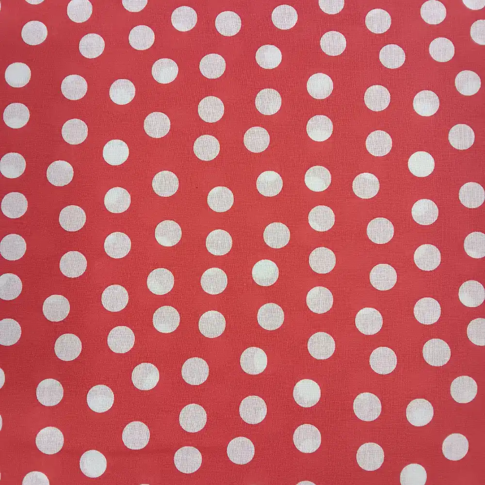 Tela roja con lunares blancos estampada, tejido ideal para confección de vestidos y proyectos de costura