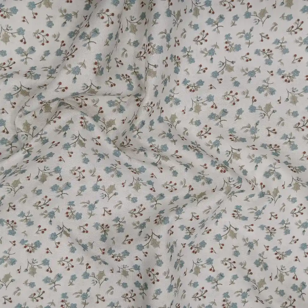 Tela de algodón con estampado de ramas de madroño y flores pequeñas sobre fondo claro