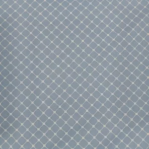 Tela de algodón azul con estampado de rombos blancos