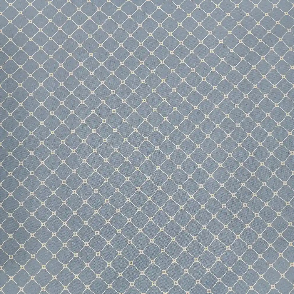 Tela de algodón azul con estampado de rombos blancos