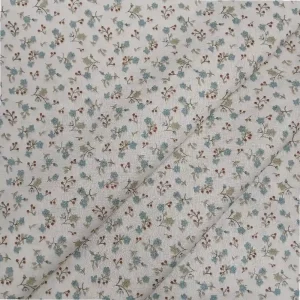 Tela de algodón con estampado de ramas de madroño y flores pequeñas sobre fondo claro