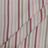 Tela de algodón con estampado de rayas verticales en tonos rosa, beige y blanco