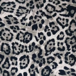 Tela de viscosa estampada Leopardo con diseño animal print en tonos neutros, ideal para confección de moda