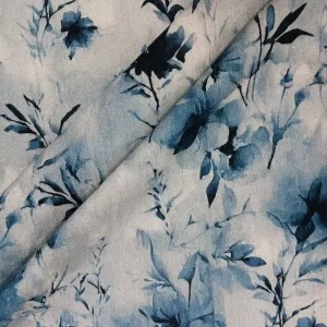 Tela viscosa lino estampada Flores Azules con diseño floral en tonos azules sobre fondo claro, ideal para confección