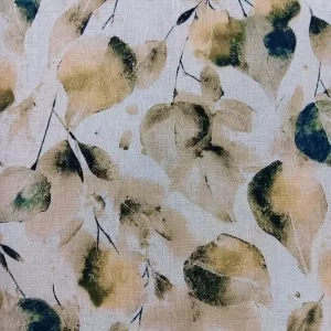 Tela viscosa lino estampada de hojas en tonos amarillos y verdes sobre fondo claro