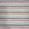 Tela de algodón con rayas horizontales dibujadas de aspecto irregular en tonos azul, verde, rojo y azul marino sobre fondo claro.