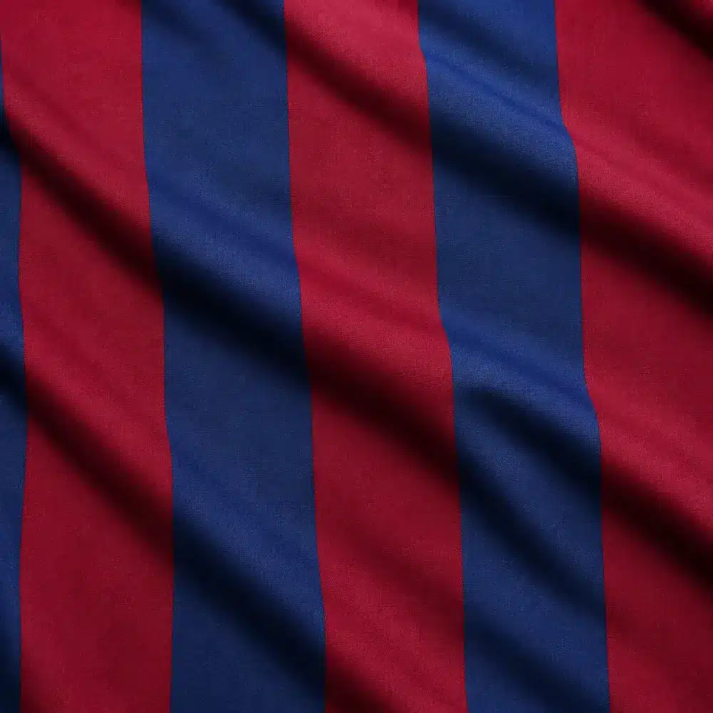 tela-bandera-blaugrana-poliester-80cm Tela bandera blaugrana de poliéster con franjas verticales azul marino y granate, ancho 80 cm.