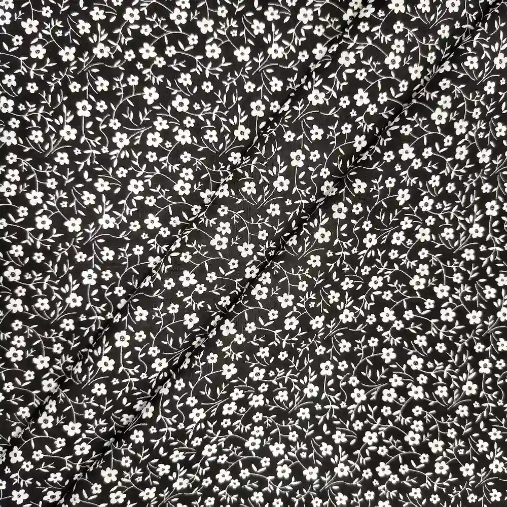 Tela de algodón negra con flores blancas - Imagen 2