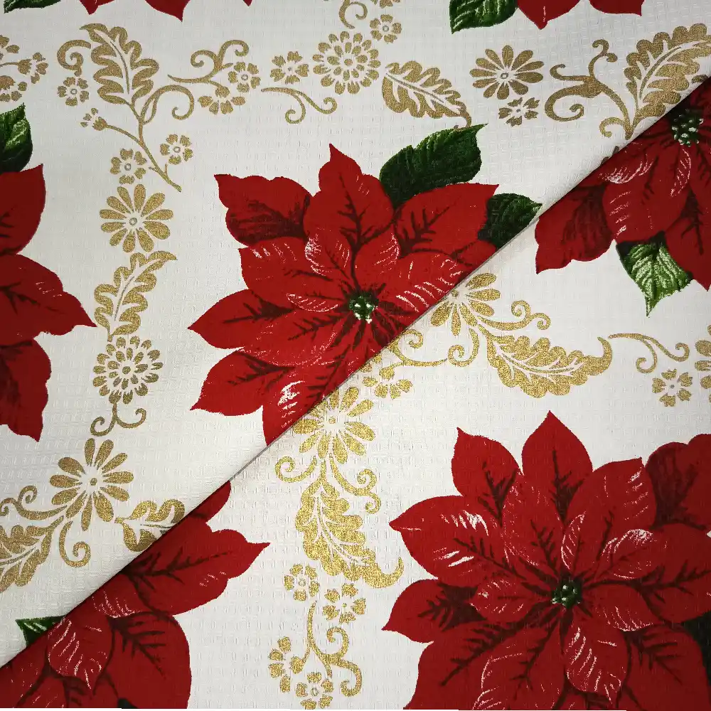 Tela de mantelería navideña con flores de Pascua y filigranas doradas - Imagen 2