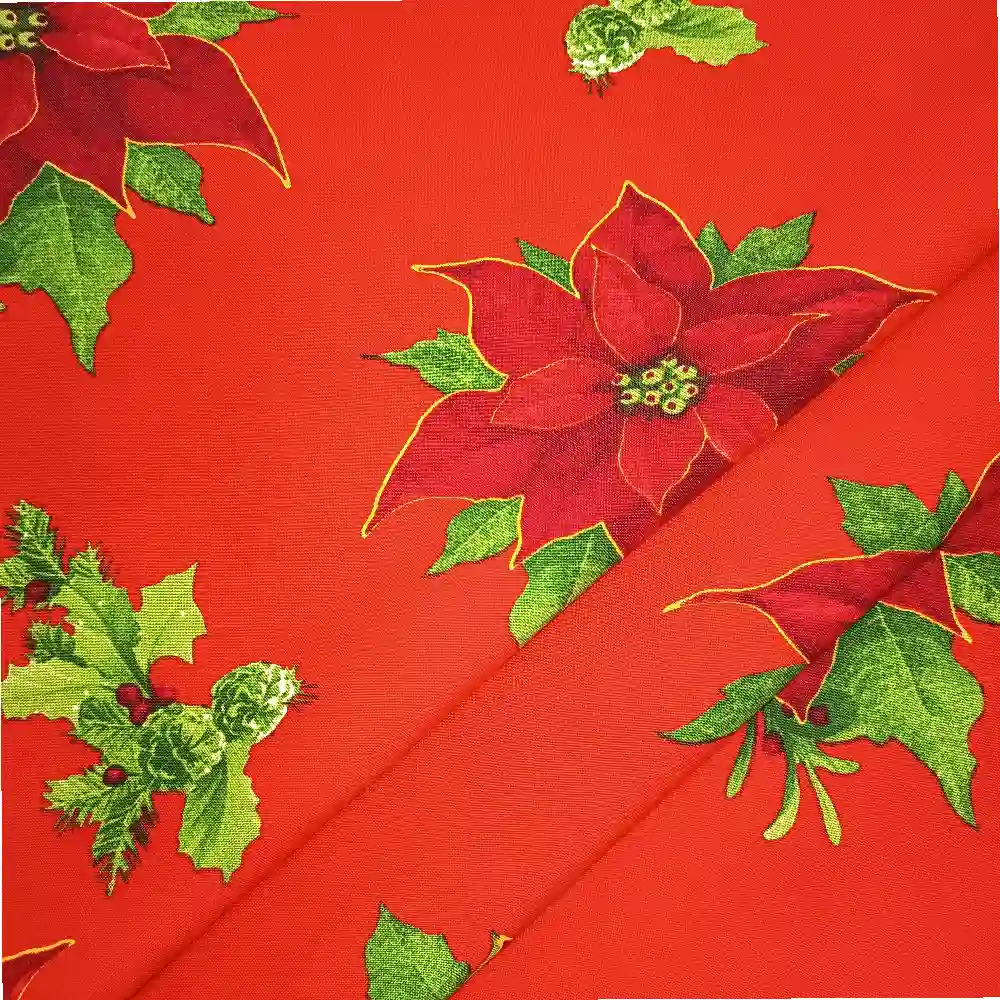 Tela de mantelería stretch navideña con fondo rojo intenso, grandes flores de Pascua rojas y burdeos, hojas verdes y pequeños detalles dorados.